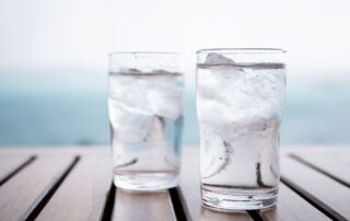Two glasses of water with ice